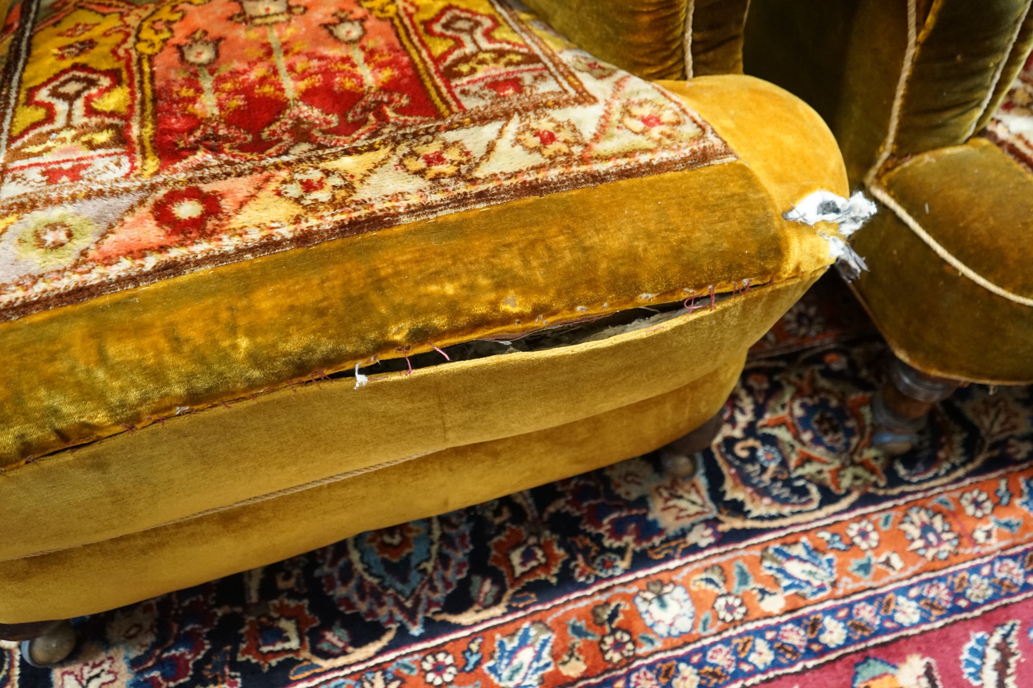 A pair of Victorian armchairs with carpet upholstery, width 90cm, depth 96cm, height 94cm